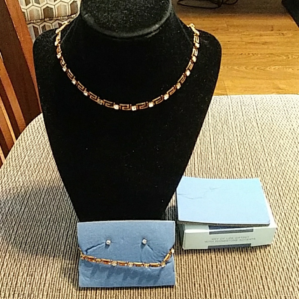 Avon gift set with rhinestone accents gold tone